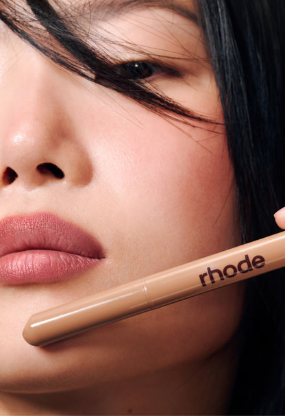 xun wears peptide lip shape in press