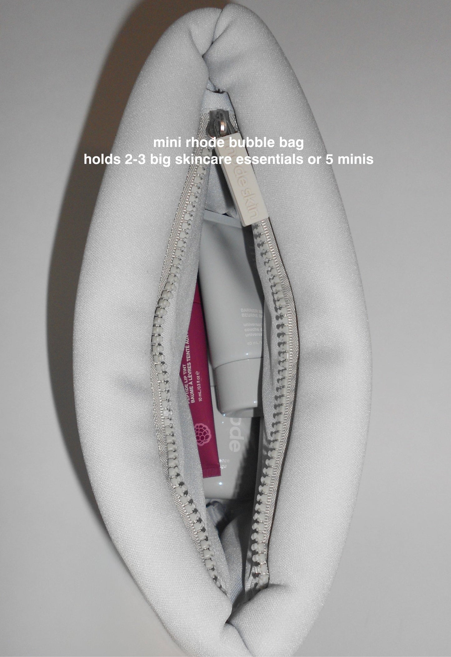 mini rhode bubble bag holds 2-3 big skincare essentials or 5 minis